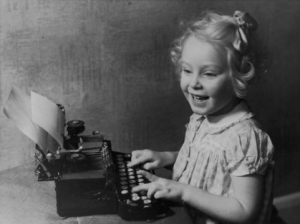 little-girl-at-typewriter